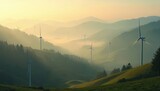 Wind turbines in misty mountain landscape at sunrise. Turbines generate renewable energy on hills. Rolling hills with trees and fog. Green hills with wind farm in countryside. Serene morning scene.