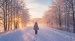 © Tida - Woman Walks Snowy Path at Sunrise - A solitary figure walks on a snow covered path during a winter sunrise, symbolizing peace, solitude, journey, resilience and hope