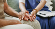 © peopleimages.com - Clipboard, empathy and nurse holding hands with old person in clinic for consulting or support. Healthcare, rehabilitation or retirement with caregiver and senior patient in session for medical care