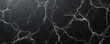 © Maryna - Dark black natural marble stone surface shows elegant white veins. Luxurious polished slab provides sophisticated texture background. Ideal material for modern interior design, floor, wall, counter