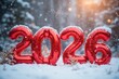 © JuLady_studio - Bright red balloons shaped as the year 2026 are nestled in soft snow, surrounded by a serene winter landscape, creating a festive atmosphere for New Year celebrations