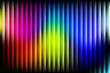 © TawfikStock - Vibrant vertical stripes of rainbow colors create a mesmerizing abstract background pattern