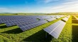 © Zahra - Aerial view of a vast solar panel farm nestled in a lush green field under a clear blue sky, concept for sustainable energy solutions, clean power initiatives and environmental conservation