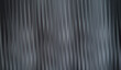© Mish - Abstract vertical lines in shades of gray, creating a sense of depth and movement. The soft, blurred effect adds an artistic touch to this simple yet captivating background