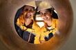 © Montri - Two engineers inspecting the inner surface of a large metal pipe. Wearing safety uniforms and helmets. Concept of industrial inspection, quality control, and manufacturing process.