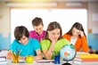 © BillionPhotos.com - Smiling children students sitting in class room