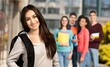 © BillionPhotos.com - Smiling female student enjoying school life