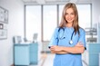 © BillionPhotos.com - Portrait of happy nurse or doctor in hospital at work.
