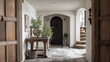 © Anna Studio - Rustic entryway with stone floor, wooden console table and arched doorways, inviting home interior design