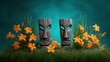 © Visual Symphony - Two tiki masks with daylilies and grass on a teal background