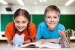 © BillionPhotos.com - Happy school children smiling study at school