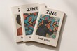 © Lif - three zines printed on recycled paper, each featuring unique local artists, casually stacked on white background