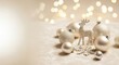 © Tatiana - Christmas ornament with reindeer, snowflake, and decorative ball on a light background with bokeh. Holiday decoration for greeting card and banner design.