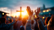 © Kateryna - Faceless Christian worshipers raising hands up high in air in front of prominent cross praise and worship moment spiritual sincere devotion religious celebration gathering
