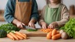 © 69 - Mother and daughter cooking together in kitchen, chopping fresh vegetables on wooden cutting board for healthy meal preparation with love and care