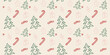 © thebeststocker - Seamless Christmas pattern with hand drawn festive doodles in red and green on a beige background. Perfect for wrapping paper, fabric, and holiday design projects