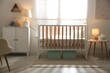 © New Africa - Blurred view of stylish baby's room with crib and dresser. Interior design