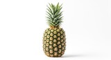 Fresh whole pineapple with green crown, isolated on a clean white background.