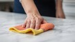 © The 2R Artificiality - Close-up of female hands scrubbing a kitchen surface using a vibrant cloth. Hygiene and cleanliness theme woman,house,kitchen,hand,home,concept,girl,work,hands,lifestyle