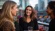 © AspctStyle - Smiling woman talking with friends during evening on city rooftop terrace, enjoying relaxed social atmosphere with drinks, representing friendship, connection, and modern lifestyle