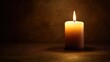© Sergey - single candle glowing softly, warm light, dark cozy background, calm and peaceful, minimalist composition