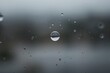 © AbstractAI - Water Droplet Clinging to Glass Pane