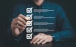 © MITA - Person checking off items on a digital to-do list with a glowing pen checklist task