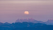 © ADDICTIVE STOCK - Full moon rising over Les Dents du Midi peaks in Switzerland