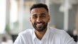 © Johannes - Portrait of young happy indian business man executive looking at camera. Eastern male professional teacher, smiling ethnic bearded entrepreneur or manager posing in office, close up face headshot., n