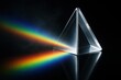 © Jelena - Prism splitting white light into vibrant spectrum on deep black reflective surface