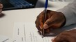 © DC Studio - Close up of candidate signing a job contract after successful interview and HR approval, recruiter and applicant review the legal terms of employment. New professional beginning. Camera B.