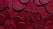 © Treesa - Close-up of vibrant red beet slices artfully arranged to create an appealing, rustic background texture, showcasing natural freshness and color ,wholefood ,farming ,garden