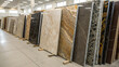 © Yudi - Diverse selection of high-quality marble and granite slabs showcasing unique patterns and colors, perfect for modern interior design