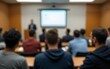 © hao - Blurred photo of the backs of students sitting in a classroom during a lecture. High quality