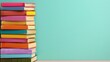 © SETSU 21 - Colorful Stack of Books Against a Light Blue Background for Educational and Inspirational Themes