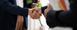 © crizzystudio - Business people shaking hands making agreement