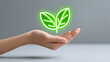 © Supot - Hand palm leaf green glow neon eco nature sustainability energy Minimal hand holding glowing green leaf symbol, soft light and smooth background, conveying eco awareness, clean energy