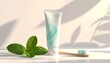 © MdEmran - Fresh mint toothpaste tube and bamboo toothbrush create a clean, natural oral care routine bathed in soft, dappled light