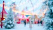 © Наталья Добровольска - Blurred winter wonderland background with sparkling snow and glowing lights.