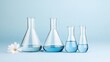 © pvl0707 - Laboratory experiment setup featuring glass beakers and test tubes against a soft blue background