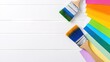 © pvl0707 - A vibrant selection of paint swatches and brushes set against a clean white background, perfect for home interior projects and decoration