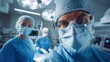 © morepiixel - A focused surgical team in scrubs and masks prepares for an operation in a sterile, high-tech operating room.