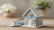 © Nattapol - Blue house model with heart shape and stethoscope representing home health care, medical property insurance, and loving checkup concept