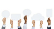 © Barny - Multiple diverse well-manicured hands in professional business attire hold transparent blank speech bubbles against a vibrant yellow studio background. Concept of new ideas and open communication