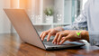 © ภาคภูมิ ปัจจังคะตา - A person using a laptop to rate customer satisfaction with five-star feedback, showing online service quality, user experience, digital communication, and business review for marketing and improvement