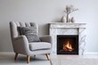© Basileus - Cozy living room features a gray armchair next to a marble fireplace with a warm fire.