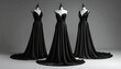 © Bandi - Three flowing black gowns displayed on headless mannequins