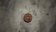 © Dzenka - Poverty concept with single rusted coin on cracked concrete ground