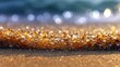 © sitiprapti - Closeup macro shot of wet sand and sea foam on a beach, with sparkling sunlight reflecting on the wet grains, creating a bokeh effect in the background