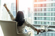 © Chinnapong - Work-Life balance and life quality lifestyle of lazy businesswoman, business woman relaxing sitting in rest, take it easy in luxury hotel guest room or city home condominium living room with city view
